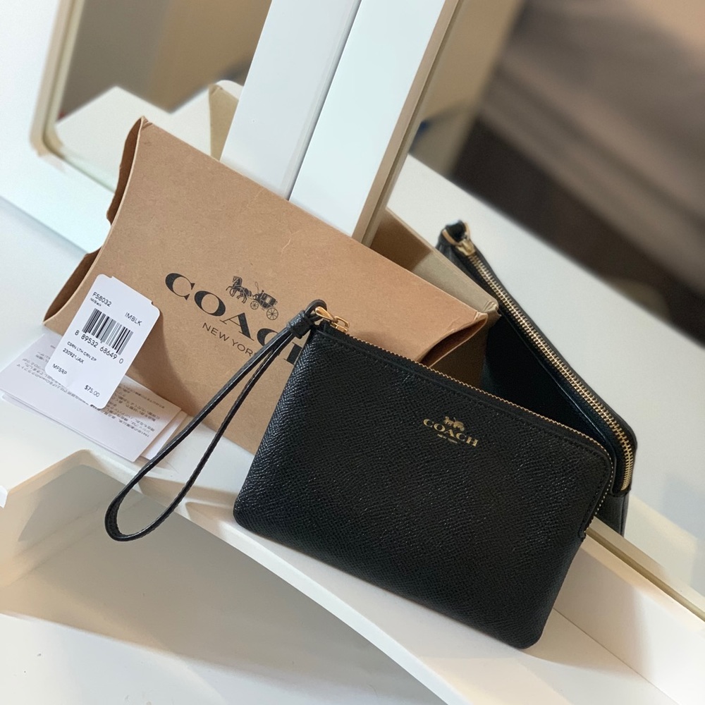 Authentic black coach wristlet with tags !